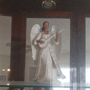 Elegant Angel Figurine with Guitar